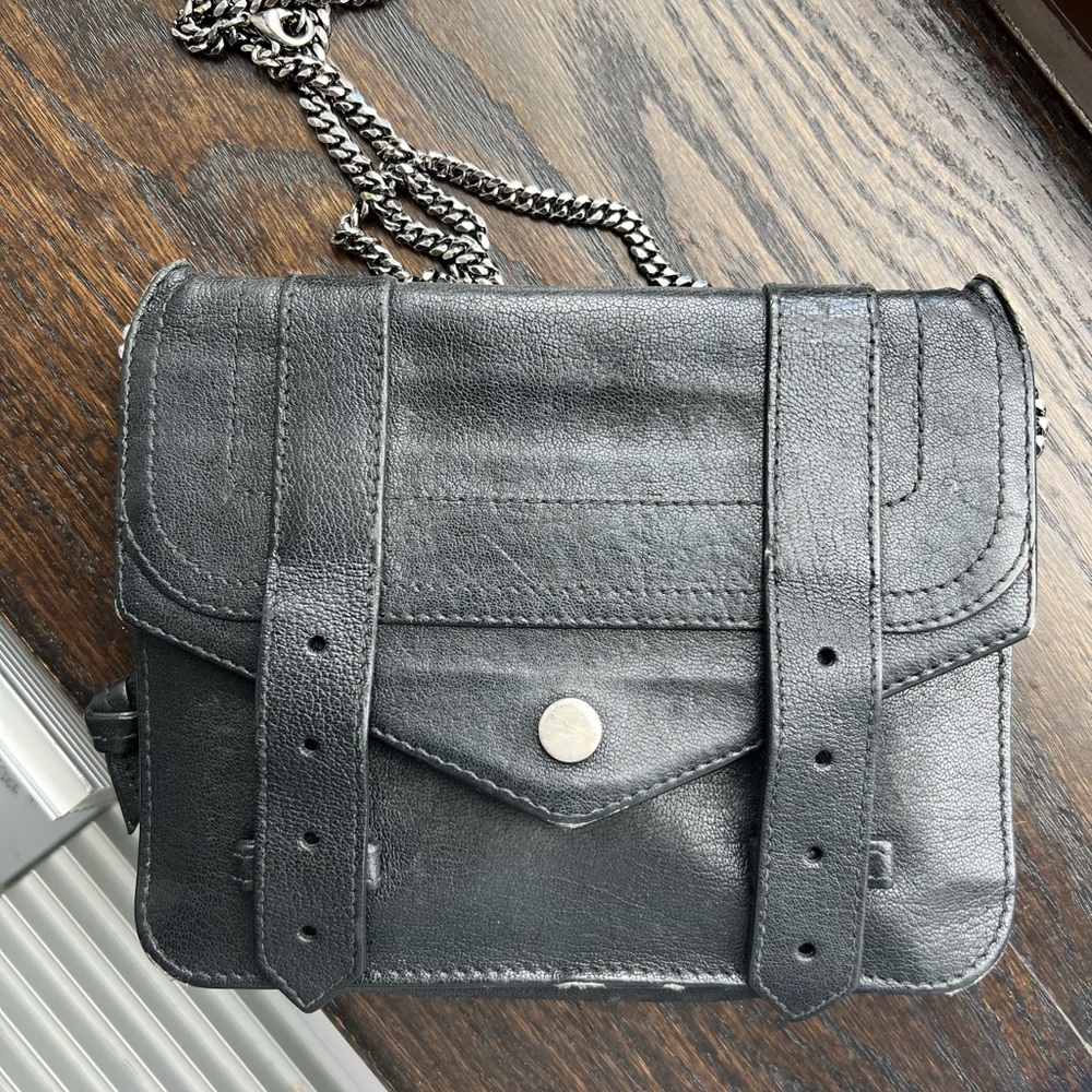 Black Proenza Night Crossbody Bag